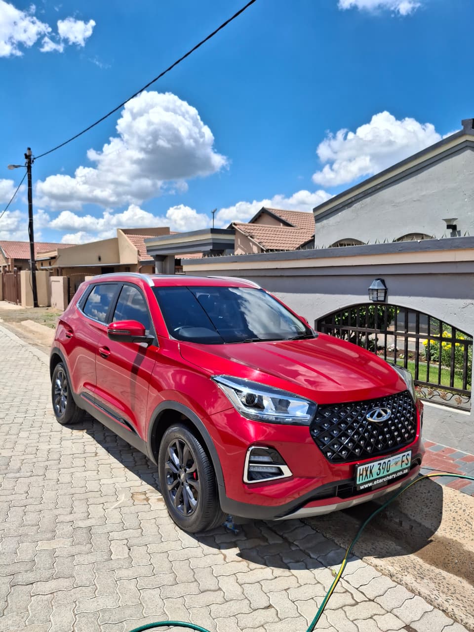 Red Chery Tiggo, finished and gleaming